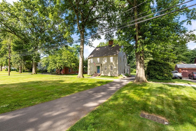 319 Main St, Wethersfield, CT 06109 - view of front of property with a chimney and a front yard