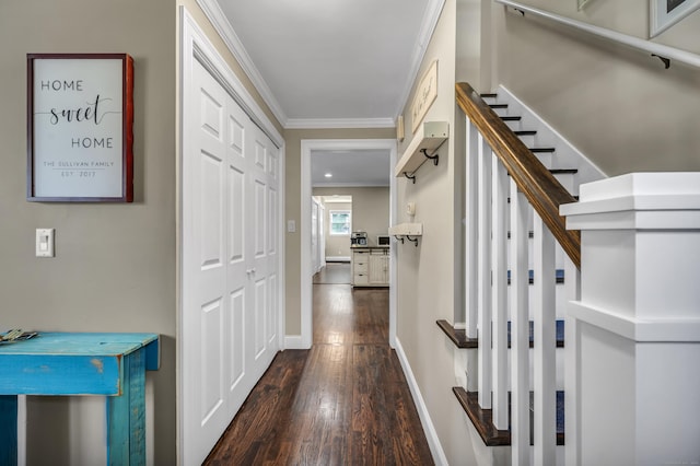 18 Holly Ln, Wallingford, CT 06492 - corridor featuring dark wood finished floors, crown molding, and stairs