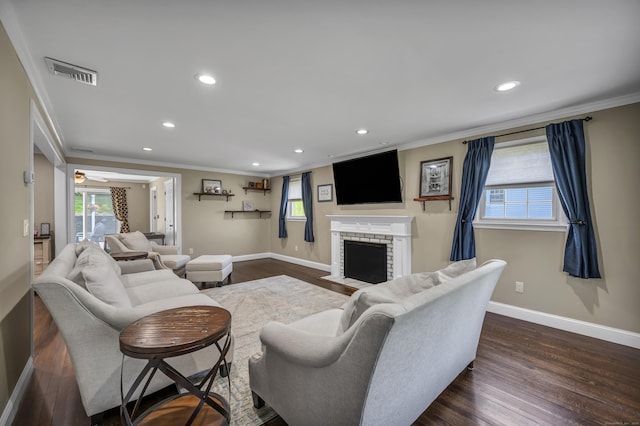18 Holly Ln, Wallingford, CT 06492 - living area featuring ornamental molding, recessed lighting, dark wood-type flooring, a brick fireplace, and a ceiling fan