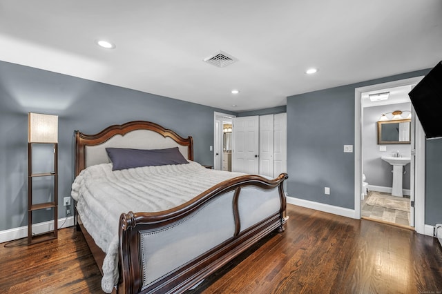 18 Holly Ln, Wallingford, CT 06492 - bedroom with hardwood / wood-style floors, a closet, recessed lighting, and ensuite bathroom