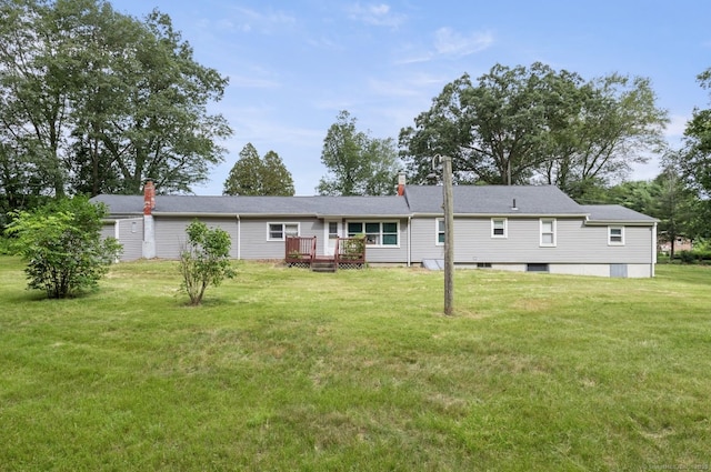 29 Cheney Rd, Pomfret, CT 06259 - back of property featuring a yard, a deck, and a chimney
