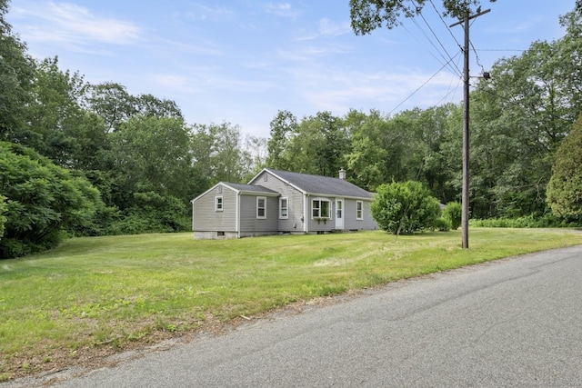 29 Cheney Rd, Pomfret, CT 06259 - view of front of home featuring a chimney and a front yard