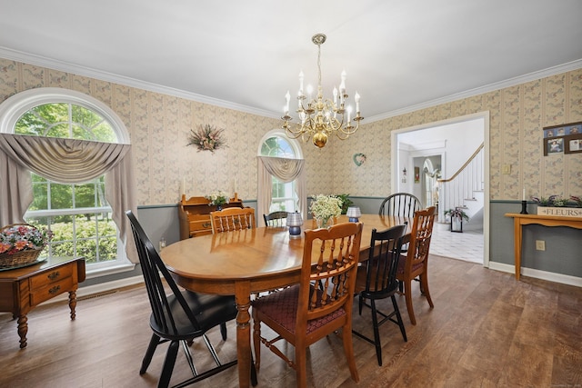 21 Hidden Pond Dr, Watertown, CT 06795 - dining room with wallpapered walls, a chandelier, wood finished floors, a wainscoted wall, and healthy amount of natural light