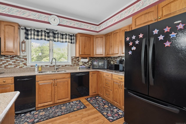 21 Hidden Pond Dr, Watertown, CT 06795 - kitchen featuring black appliances, light wood-type flooring, backsplash, and brown cabinets