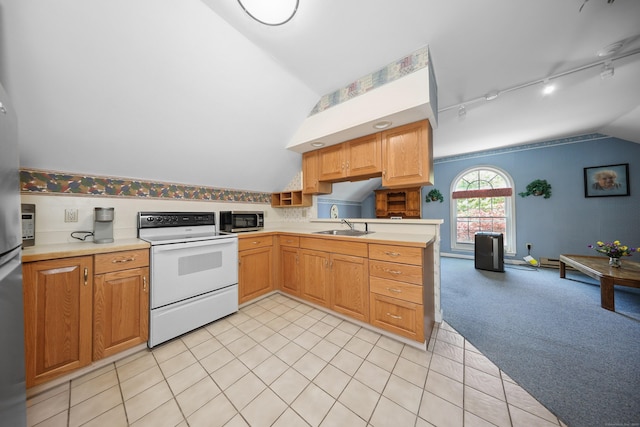 21 Hidden Pond Dr, Watertown, CT 06795 - kitchen with white range with electric stovetop, lofted ceiling, stainless steel microwave, rail lighting, and light countertops