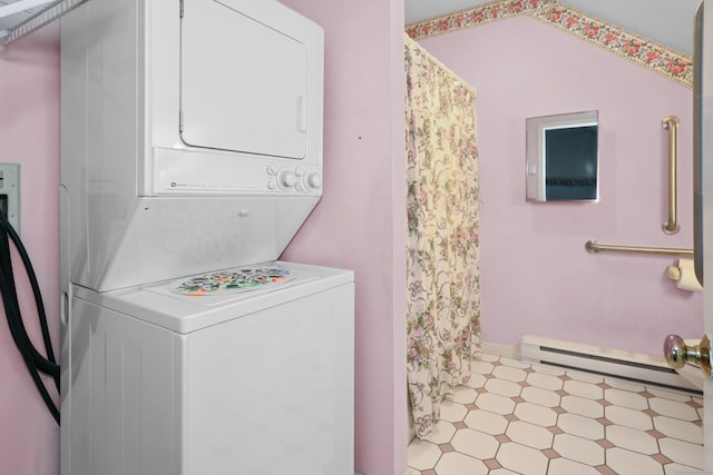 21 Hidden Pond Dr, Watertown, CT 06795 - washroom featuring stacked washer and clothes dryer, baseboard heating, and tile patterned floors