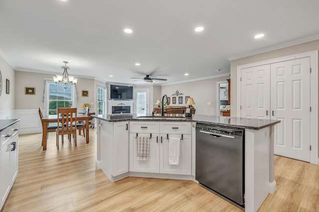 54 Pondview Cir Unit 54, Beacon Falls, CT 06403 - kitchen with dishwasher, healthy amount of natural light, white cabinets, ornamental molding, and a center island with sink