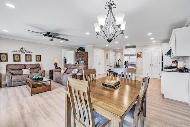 54 Pondview Cir Unit 54, Beacon Falls, CT 06403 - dining room featuring recessed lighting, a ceiling fan, light wood-style flooring, crown molding, and a chandelier