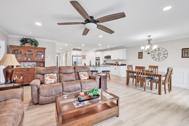 54 Pondview Cir Unit 54, Beacon Falls, CT 06403 - living room featuring crown molding, a chandelier, a ceiling fan, light wood finished floors, and recessed lighting