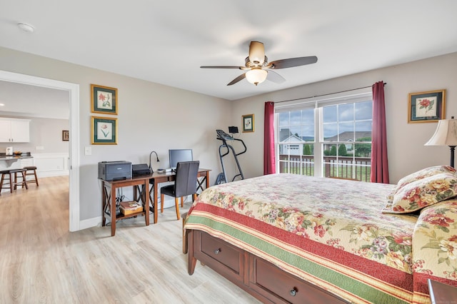 54 Pondview Cir Unit 54, Beacon Falls, CT 06403 - bedroom with light wood-type flooring, a desk, and a ceiling fan