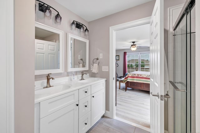 54 Pondview Cir Unit 54, Beacon Falls, CT 06403 - bathroom with ensuite bath, double vanity, a stall shower, a ceiling fan, and tile patterned floors