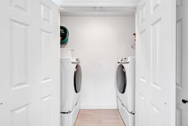 54 Pondview Cir Unit 54, Beacon Falls, CT 06403 - washroom with washer and dryer and light wood finished floors