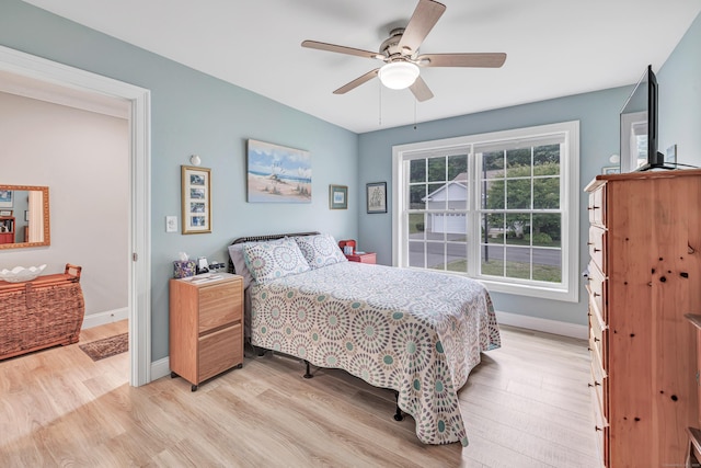 54 Pondview Cir Unit 54, Beacon Falls, CT 06403 - bedroom with light wood finished floors and a ceiling fan