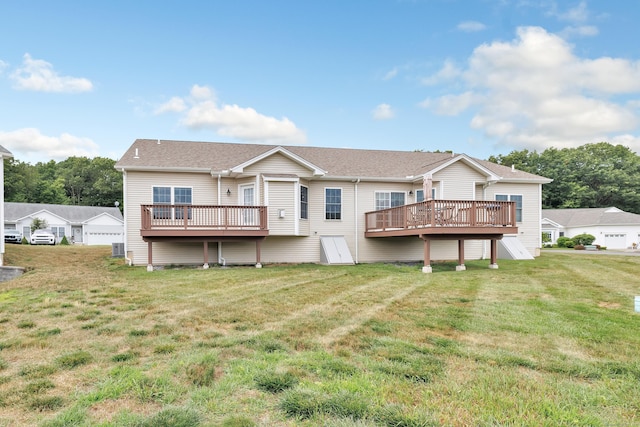 54 Pondview Cir Unit 54, Beacon Falls, CT 06403 - rear view of property featuring a deck and a yard