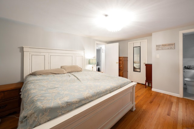 16 Skidmore Ln, Newtown, CT 06482 - bedroom with light wood-style flooring and baseboards