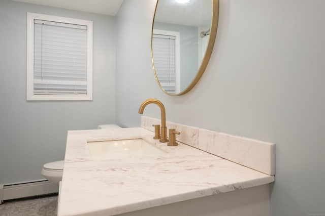 16 Skidmore Ln, Newtown, CT 06482 - bathroom featuring baseboard heating and vanity
