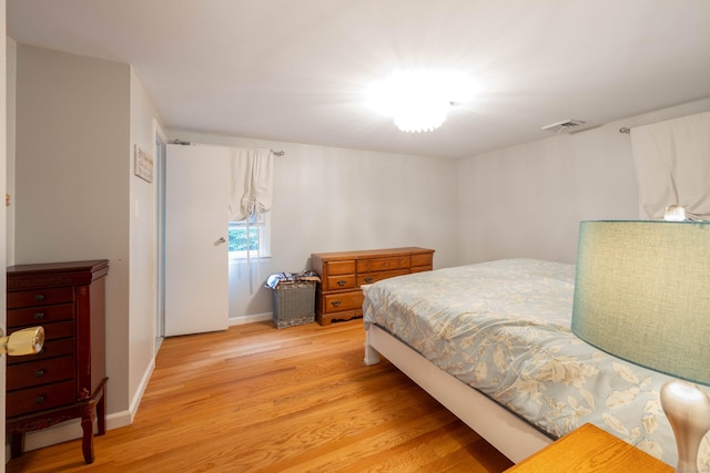 16 Skidmore Ln, Newtown, CT 06482 - bedroom with light wood-type flooring and baseboards