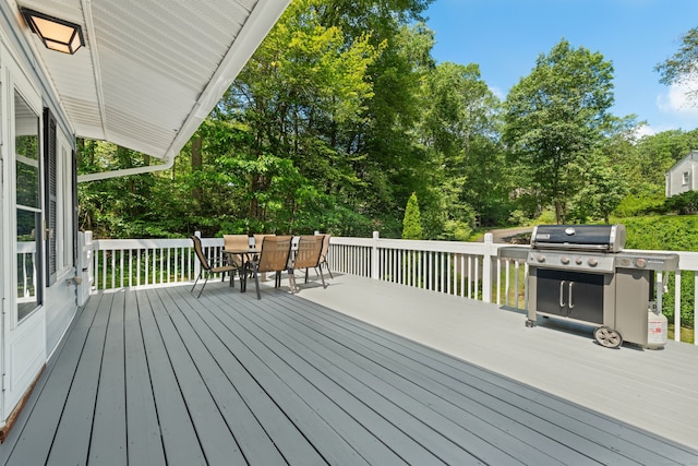 84 Kanungum Trl, Shelton, CT 06484 - wooden terrace with outdoor dining space, area for grilling, and view of wooded area
