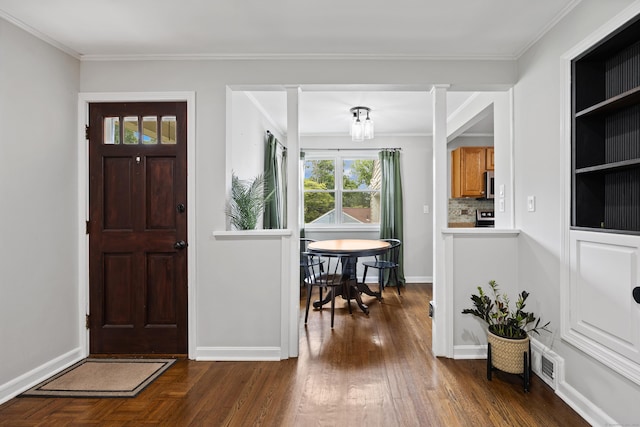 96 Douglas Dr, Meriden, CT 06451 - foyer entrance with ornamental molding and dark wood finished floors