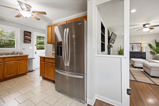 96 Douglas Dr, Meriden, CT 06451 - kitchen featuring stainless steel fridge, ceiling fan, ornamental molding, brown cabinets, and recessed lighting