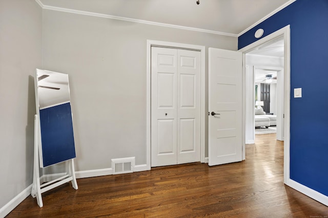 96 Douglas Dr, Meriden, CT 06451 - unfurnished bedroom with ornamental molding, wood finished floors, and a closet