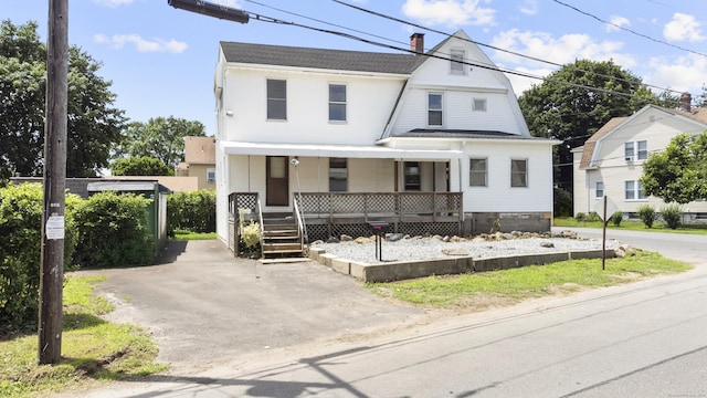 124 Geddes Ter, Waterbury, CT 06708 - colonial inspired home with a porch, a chimney, and a gambrel roof