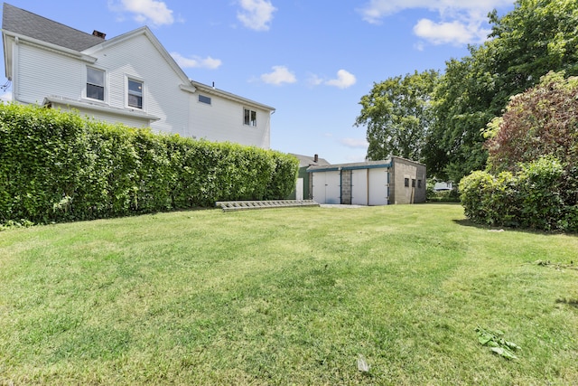 124 Geddes Ter, Waterbury, CT 06708 - view of green lawn with an outbuilding