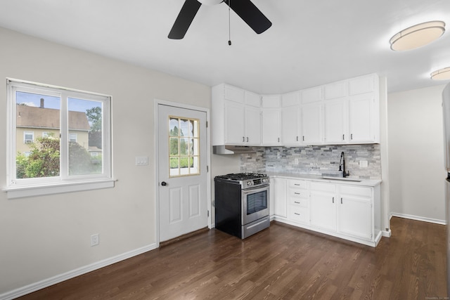 124 Geddes Ter, Waterbury, CT 06708 - kitchen with gas stove, a ceiling fan, and dark wood-style floors