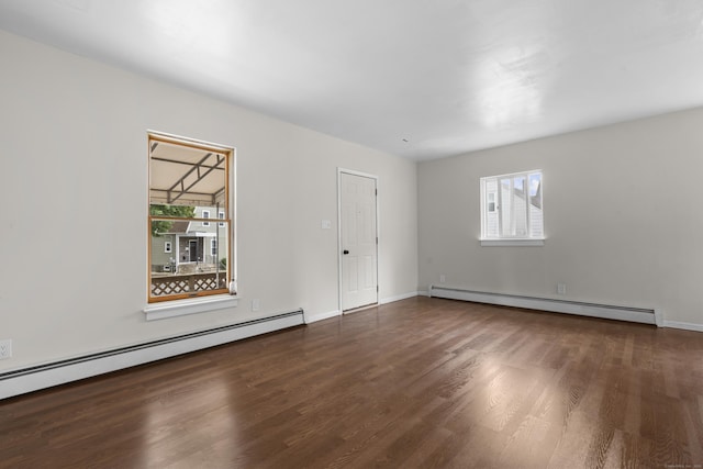 124 Geddes Ter, Waterbury, CT 06708 - spare room with a baseboard heating unit, plenty of natural light, and wood finished floors