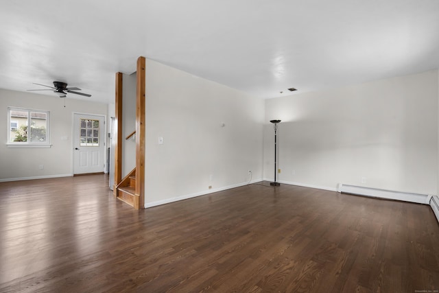 124 Geddes Ter, Waterbury, CT 06708 - spare room featuring a ceiling fan, dark wood finished floors, stairway, and a baseboard radiator