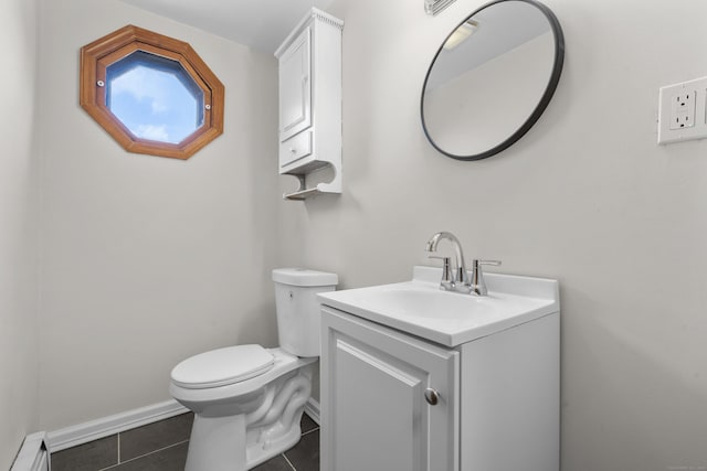 124 Geddes Ter, Waterbury, CT 06708 - half bathroom with baseboard heating, tile patterned floors, and vanity