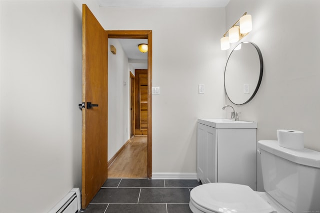 124 Geddes Ter, Waterbury, CT 06708 - bathroom with a baseboard heating unit, tile patterned floors, and vanity
