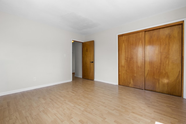 124 Geddes Ter, Waterbury, CT 06708 - unfurnished bedroom with light wood finished floors and a closet