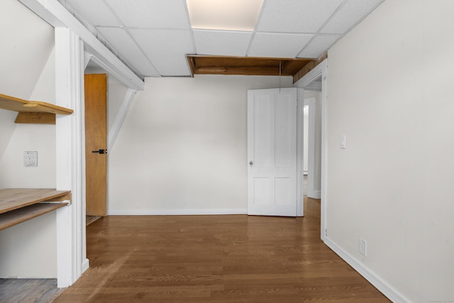 124 Geddes Ter, Waterbury, CT 06708 - basement with a paneled ceiling and wood finished floors