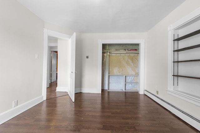 124 Geddes Ter, Waterbury, CT 06708 - unfurnished bedroom with baseboard heating and wood finished floors