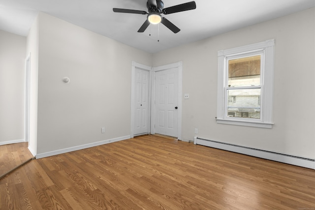 124 Geddes Ter, Waterbury, CT 06708 - unfurnished bedroom featuring light wood-type flooring, a baseboard radiator, and a ceiling fan