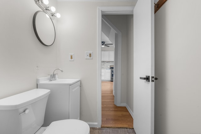 124 Geddes Ter, Waterbury, CT 06708 - half bathroom featuring vanity, tasteful backsplash, and a ceiling fan