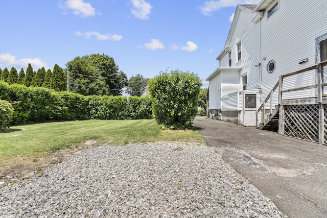 124 Geddes Ter, Waterbury, CT 06708 - view of grassy yard with driveway