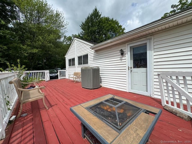 860 Suffield St, Suffield, CT 06078 - deck with an outdoor fire pit