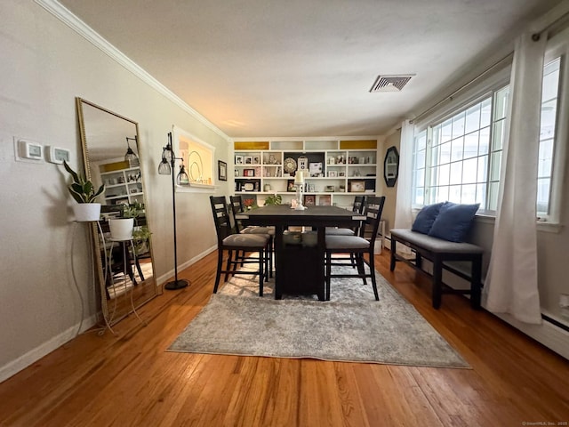 860 Suffield St, Suffield, CT 06078 - dining room with wood finished floors and crown molding