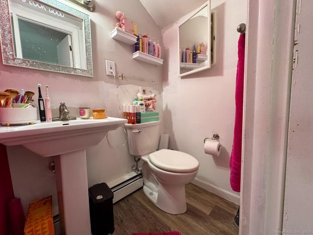 860 Suffield St, Suffield, CT 06078 - bathroom featuring baseboard heating, wood finished floors, and vaulted ceiling