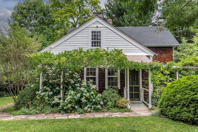 32 Cherniske Rd, New Milford, CT 06776 - view of front facade featuring a shingled roof and a chimney