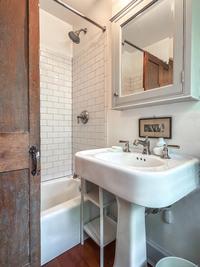32 Cherniske Rd, New Milford, CT 06776 - bathroom with shower / bath combination and wood finished floors
