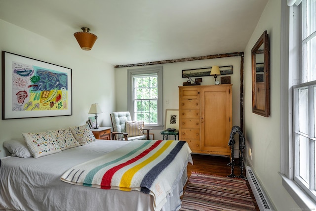 32 Cherniske Rd, New Milford, CT 06776 - bedroom with a baseboard heating unit and dark wood-type flooring