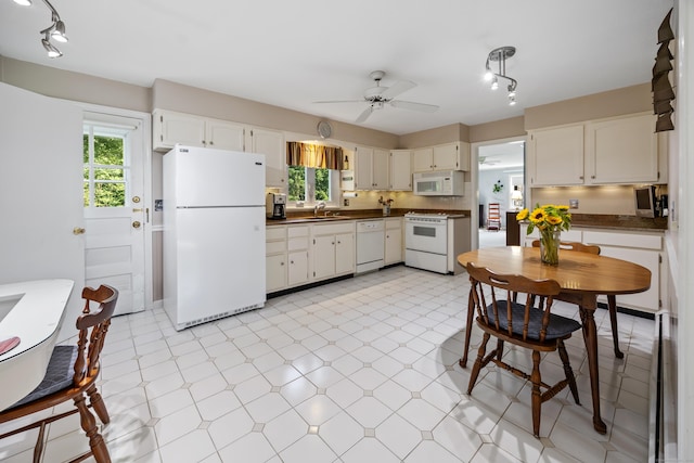 622 Wiese Rd, Cheshire, CT 06410 - kitchen featuring white appliances, dark countertops, light floors, and ceiling fan