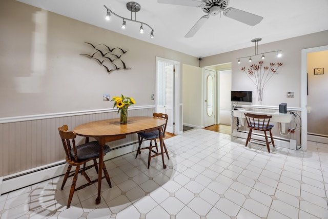 622 Wiese Rd, Cheshire, CT 06410 - dining area with a wainscoted wall, light flooring, baseboard heating, and a ceiling fan