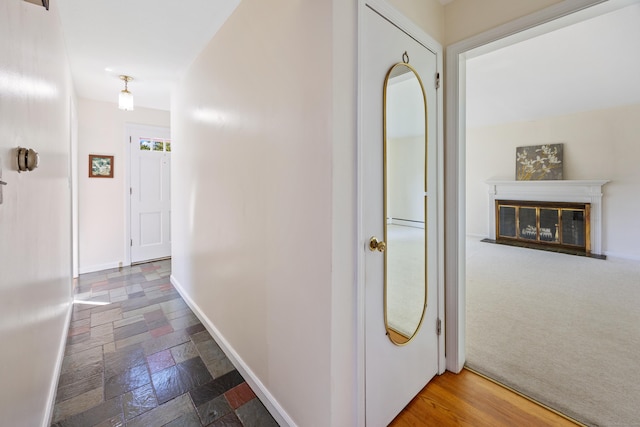 622 Wiese Rd, Cheshire, CT 06410 - hall with baseboards and stone tile floors