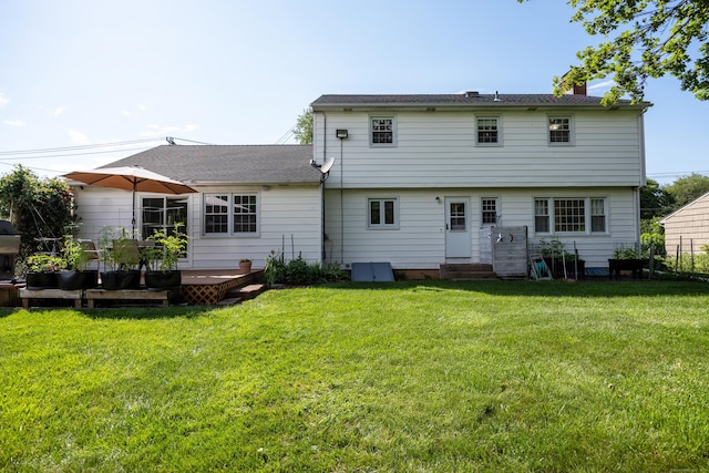 622 Wiese Rd, Cheshire, CT 06410 - back of property with a chimney, a lawn, entry steps, and a wooden deck