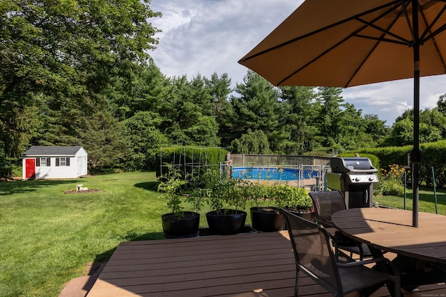622 Wiese Rd, Cheshire, CT 06410 - deck featuring outdoor dining area, an outbuilding, and area for grilling