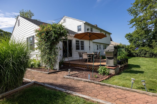 622 Wiese Rd, Cheshire, CT 06410 - rear view of house featuring a lawn and a wooden deck